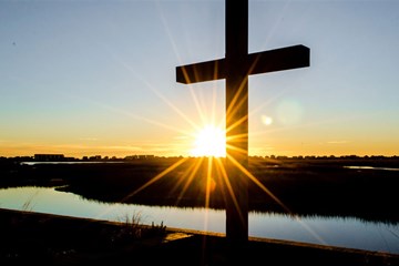 Sunrise behind the cross at Belin Memorial United Methodist Church in Murrells Inlet, South Carolina by Austin Bond Photography.
