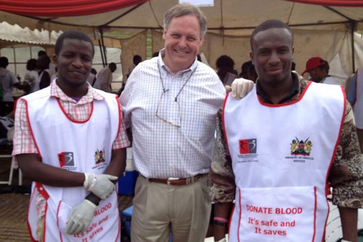Scott Gilpin (center) stands with Red Cross workers with whom he volunteered in the days following the Westgate Mall massacre in Kenya. Photo courtesy of Scott Gilpin. 