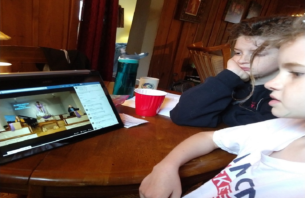 Children from Glendale United Methodist Church in Nashville , Tennessee, watch the online worship service at home during the coronavirus pandemic. Photo courtesy of Glendale United Methodist Church