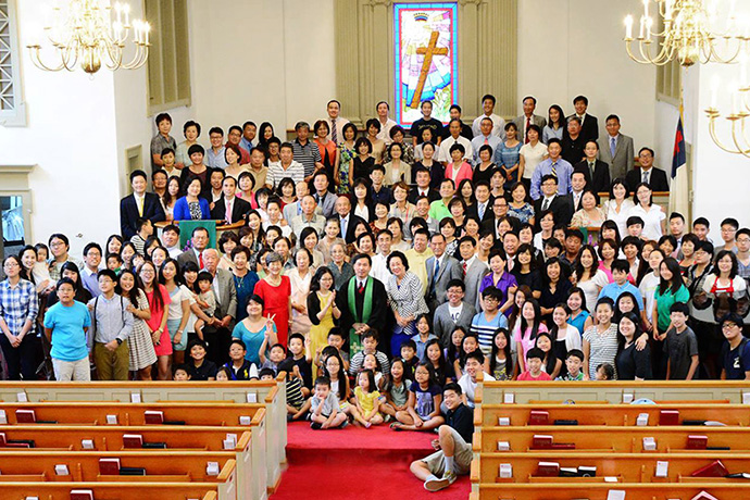 Members of Emmaus United Methodist Church in Richmond, Va., gather for a group photo before the COVID-19 pandemic. A church member who is a registered nurse helped lead a vaccination effort that immunized 100% of the congregation. Photo courtesy of Emmaus United Methodist Church.