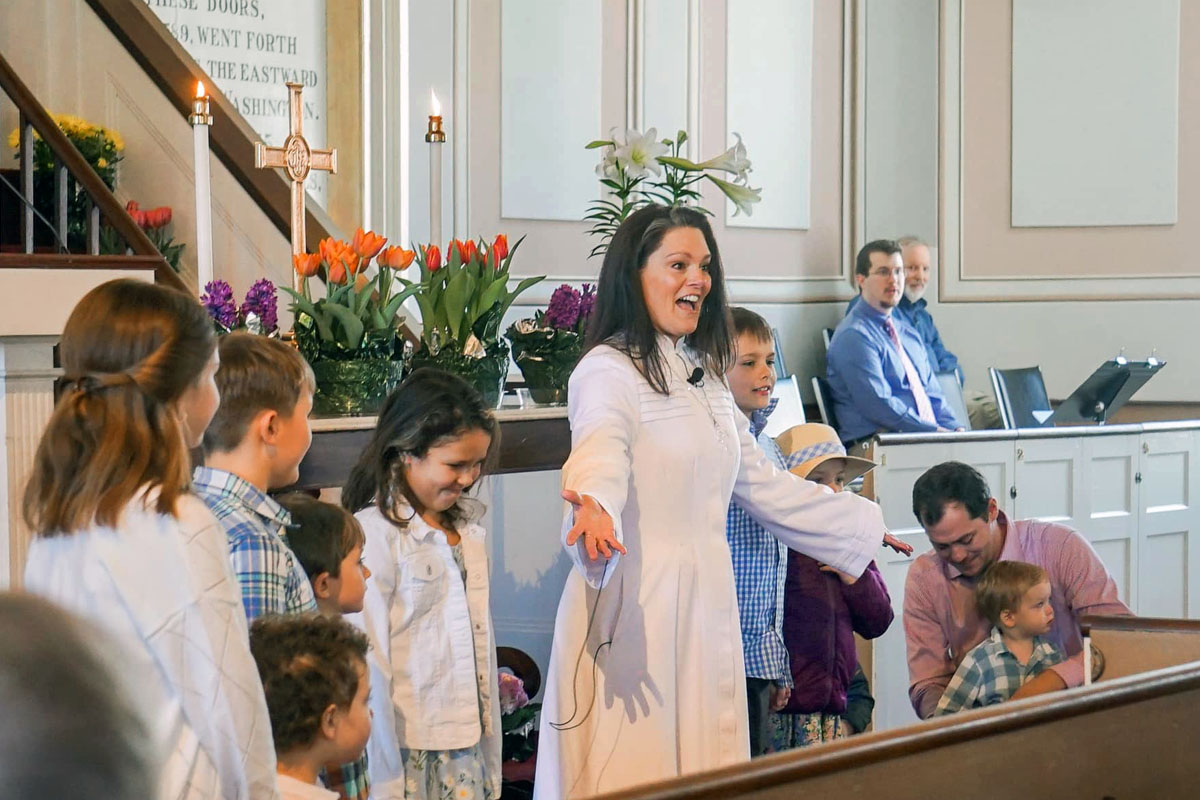The Rev. Laurel Cockrill (center), a former Fuller Theological Seminary student of the Rev. Frank Lyman, now serves a Presbyterian church in Massachusetts where George Whitefield is buried beneath the pulpit. Whitefield was John Wesley’s protégé and rival. Photo courtesy of the Rev. Frank Lyman.