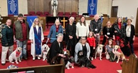 Therapy dogs attend the Blue Christmas worship service every year to offer comfort to those who are grieving. Photo courtesy of the Community Pet Ministry at Pinnacle View UMC.