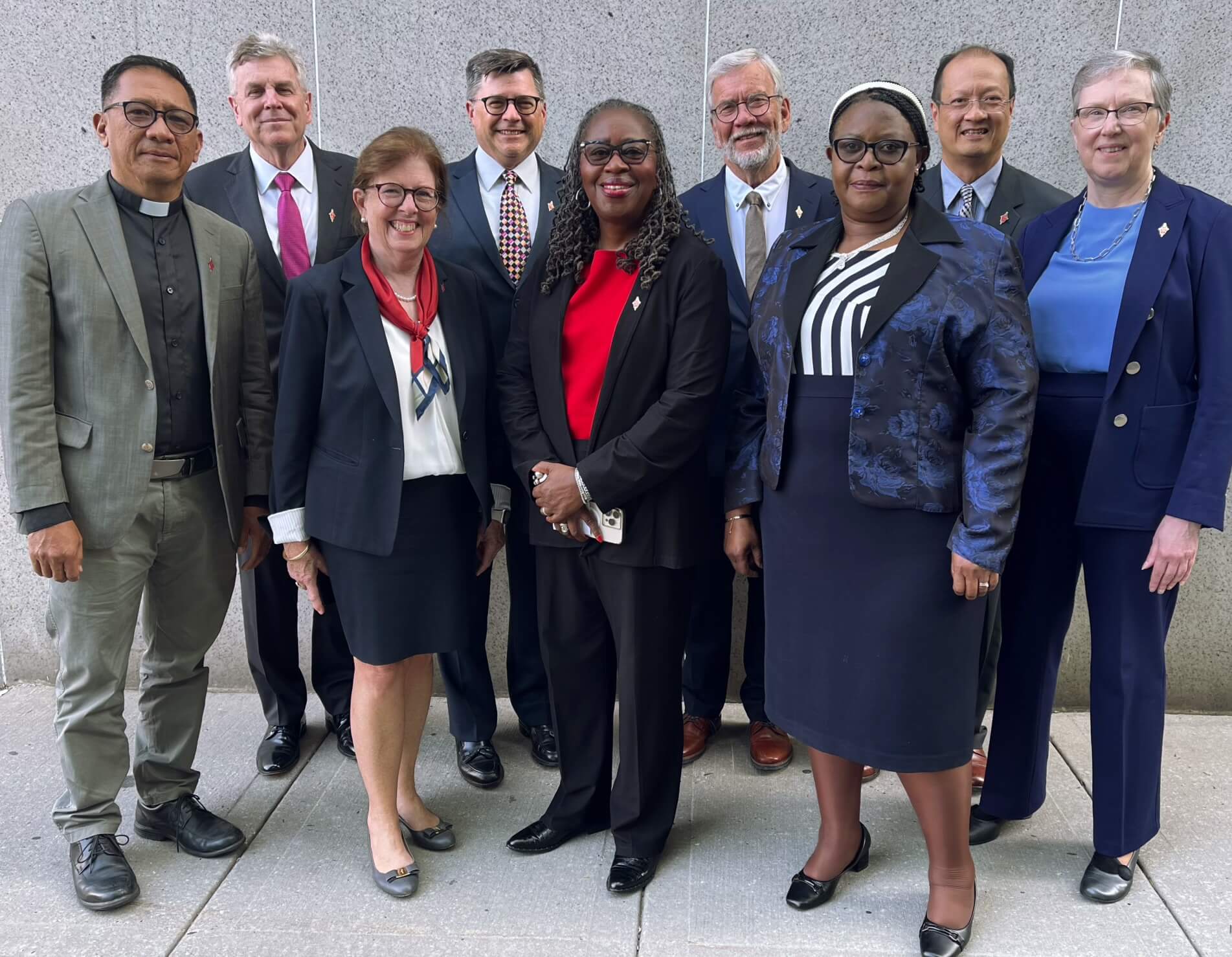 Members of the 2024-2028 Judicial Council, from left, are: Front row, The Rev. Jonathan Ulanday, the Rev. Susan Henry-Crowe, the Rev.  Angela Brown and Molly Hiekani Mwayera and back row, Bill Waddell, Andrew Vorbrich, the Rev. Øyvind Helliesen, the Rev. Luan-Vu Tran and Harriett Jane Olson. UM News Photo by Linda Bloom