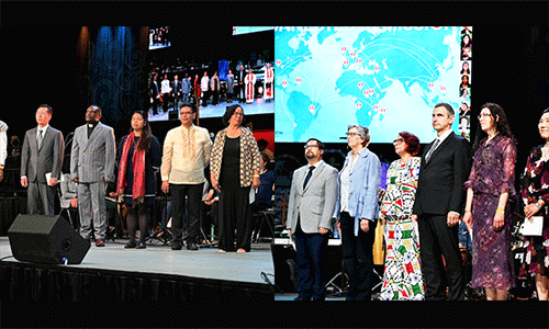 Missionaries commissioned for service during General Conference, May 2, 2024, Charlotte, NC. L to R: Rachel Therieh, Jean Martial Mbah, Mamei Sombo Lansana; D. Kim; Eric Kalumba; Sara Mae Gabuyo; Gilvren Decal and Rosangelica Acevedo, Daniel Contreras Varas; Jane Eesley; Karen Lissa Goodwin; Leslaw Kalawec; Michelle Kunce; S. Lee and Valdir Seibel, Pedro Zavala. (Photo: Christie R. House)