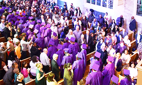 Graduates process into Northwestern University's Alice Millar Chapel during the 2025 Commencement ceremony for Garrett-Evangelical Theology Seminary.